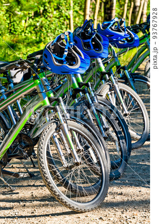 Rental bikes and helmets ready for adventure tour 93767928