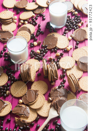 children's snack based on cookies, chocolate and milk 93772423