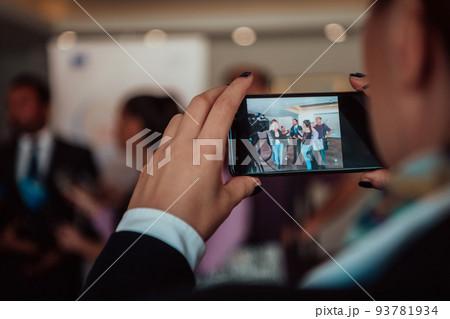 professional video production camera recording live event on stage. television social media broadcasting seminar conference. 93781934