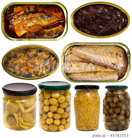Assorted various canned goods with meat, vegetables and seafood on a white background Assorted various canned goods with meat, vegetables and seafood on a white background 93782353