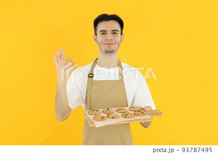 Concept of cooking with young attractive man 93787495