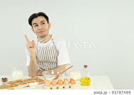 Concept of cooking with young attractive man 93787499