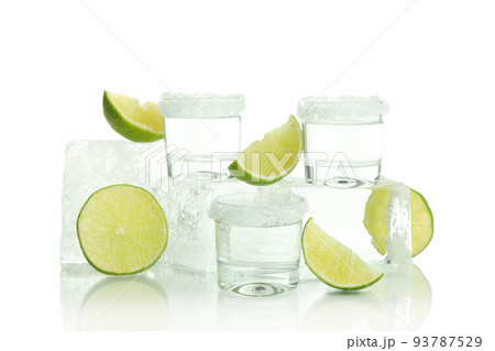 Shots, lime and ice isolated on white background Shots, lime and ice isolated on white background 93787529