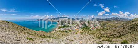 Scenic Panoramic view on resort city Sudak in Crimea from cape Alchak. Copy space. The concept of an travel, relax, active and healthy life in harmony with nature. 93788087