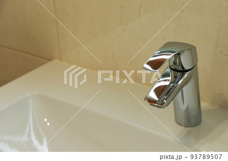 Faucet in modern bathroom, space for text 93789507