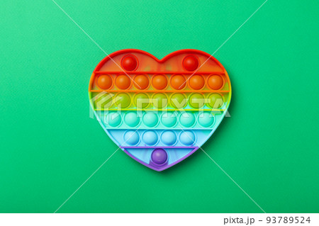 Pop it on mint background, top view Pop it on mint background, top view 93789524