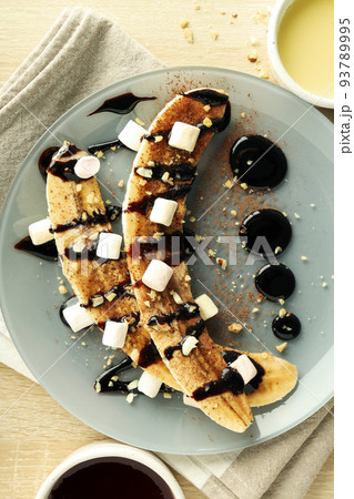 Concept of tasty food, banana dessert, top view Concept of tasty food, banana dessert, top view 93789995