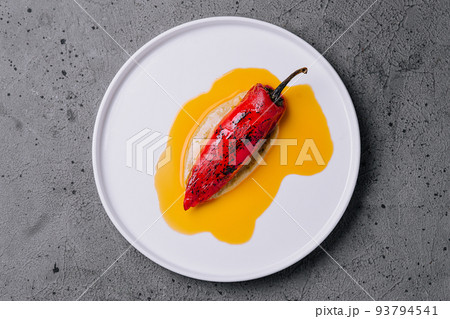 grilled peppers on a white plate grilled peppers on a white plate 93794541