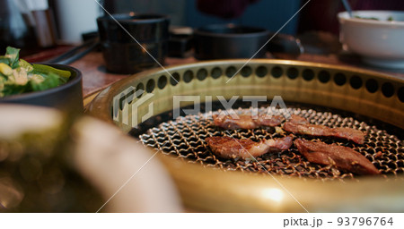 Fresh slice of beef grilled on the stove in restaurant Fresh slice of beef grilled on the stove in restaurant 93796764