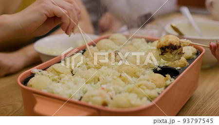 Making takoyaki, Octopus ball at home in the evening Making takoyaki, Octopus ball at home in the evening 93797545
