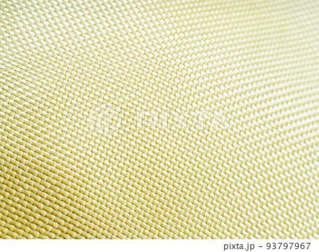 Bulletproof material aramid. Aramid kevlar background. Golden kevlar texture and pattern. Bulletproof material aramid. Aramid kevlar background. Golden kevlar texture and pattern. 93797967