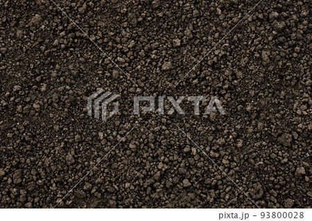 Organic farm soil background top view from above. Background black soil texture ground close up. Ukrainian organic soil ground earth texture dark design. Humus. Agriculture 93800028