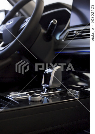 Interior of new modern unknown car in showroom. 93802425