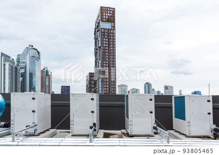 Air conditioner compressor installed on roof building.  93805465