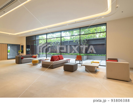 Inside of modern hotel lobby, entrance and reception, waiting area with urban city view of outdoor, indoor. Inside of modern hotel lobby, entrance and reception, waiting area with urban city view of outdoor, indoor. 93806388