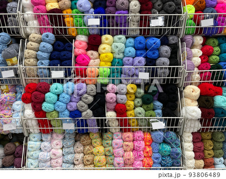 Balls of yarn for knitting. The concept of needlework and knitting. Texture Balls of yarn for knitting. The concept of needlework and knitting. Texture 93806489