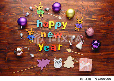 Happy new year 2023 background new year holidays card. Flat lay. Wooden background 93806506