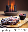 grilled ribeye steak on wooden board 93816789