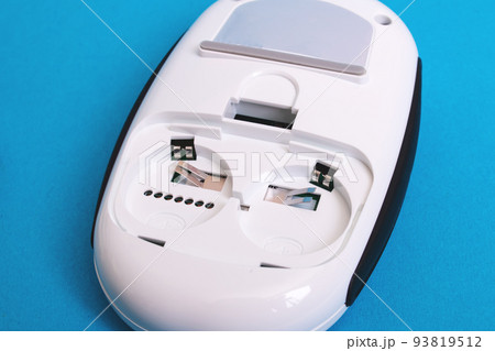 Battery connector in electronic device on blue background 93819512