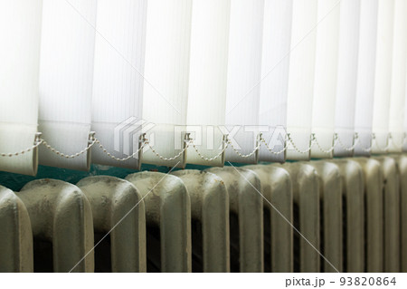 White blinds on the window above the radiator White blinds on the window above the radiator 93820864