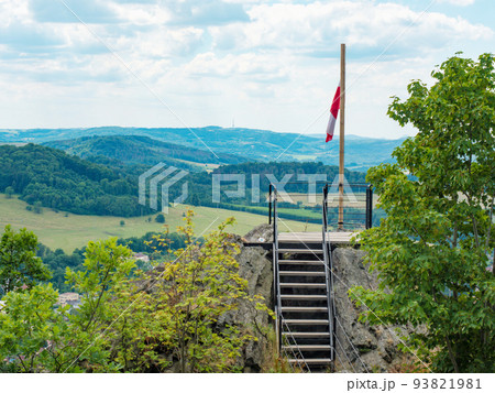 Flag of Ceska Kamenice town flying in the wind on wooden pole. Ceska Kamenice town symbol, Czech Republic Flag of Ceska Kamenice town flying in the wind on wooden pole. Ceska Kamenice town symbol, Czech Republic 93821981