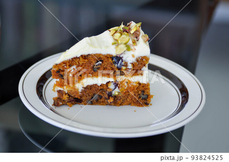 carrot and raisin cake with pistachio topping , carrot cake carrot and raisin cake with pistachio topping , carrot cake 93824525