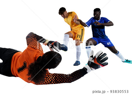 Goalkeeper catches the ball in the stadium during a football game. Goalkeeper catches the ball in the stadium during a football game. 93830553