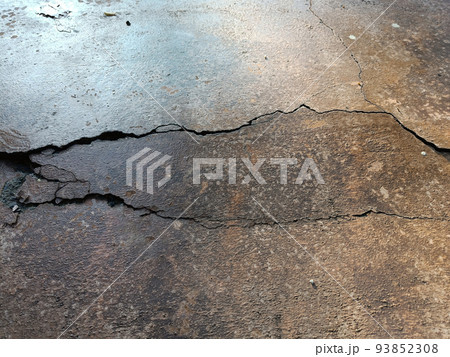 Cracked concrete ground broken at floor home or street road subside from earthquake_2 Cracked concrete ground broken at floor home or street road subside from earthquake_2 93852308