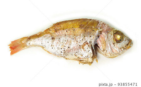Grilled fish top view and close up. Healthy baked sea food for lunch. Cooking fried meal. Grilled fish top view and close up. Healthy baked sea food for lunch. Cooking fried meal. 93855471