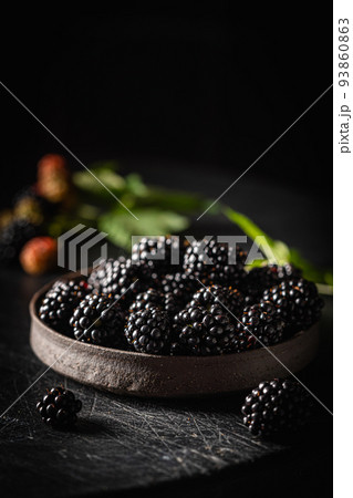 Ripe blackberries with leaves Ripe blackberries with leaves 93860863