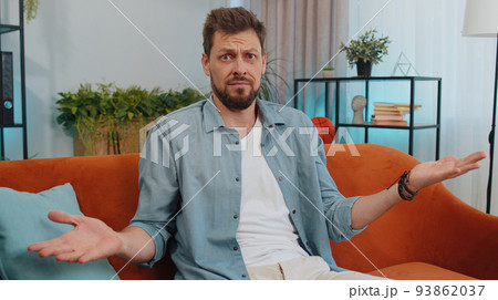 Young man guy asking why, what reason of failure, demonstrating disbelief irritation by troubles Young man guy asking why, what reason of failure, demonstrating disbelief irritation by troubles 93862037