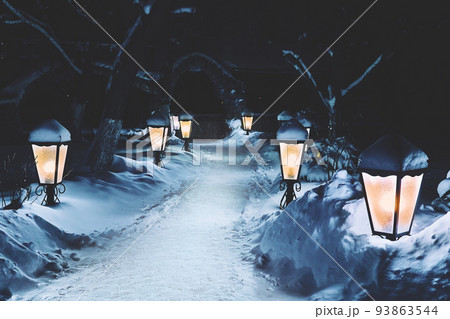 Magic path with lanterns in the winter fairy kingdom 93863544