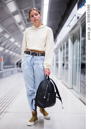 Portrait of a girl in the subway, walking on the platform Portrait of a girl in the subway, walking on the platform 93865986