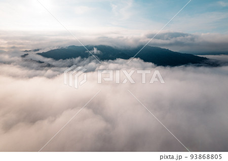 Fog in the mountains at sunrise. Morning fog in the mountains Fog in the mountains at sunrise. Morning fog in the mountains 93868805