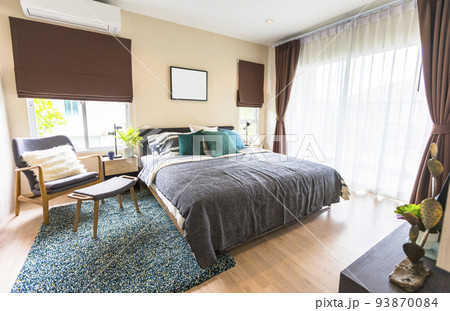 Modern bedroom interior design in green tones, natural textures with wooden bedframe Modern bedroom interior design in green tones, natural textures with wooden bedframe 93870084