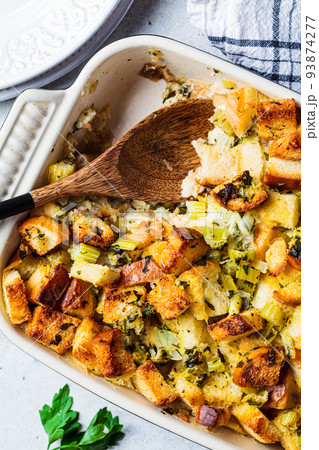 Traditional Thanksgiving stuffing. Bread casserole with celery. 93874277