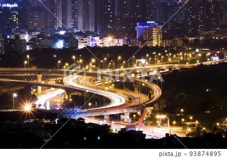 Over view of a Unique City Highway and Interchanges at night in Kaohsiung, Taiwan. Over view of a Unique City Highway and Interchanges at night in Kaohsiung, Taiwan. 93874895