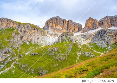 Sasso Pordoi ridge and cableway from Passo Pordoi 93883679