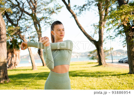 Woman Stretching And Warming-Up Before Running 93886954
