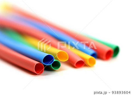 Close up view of colorful electrical cable sleeves. Close up view of colorful electrical cable sleeves. 93893604