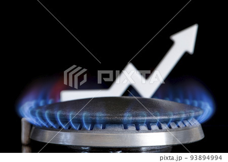Propane gas price. Supply chains and the energy gas crisis. The concept of gas import and export, transit. Gas stove with burning flame and graph arrow pointing up. Propane gas price. Supply chains and the energy gas crisis. The concept of gas import and export, transit. Gas stove with burning flame and graph arrow pointing up. 93894994