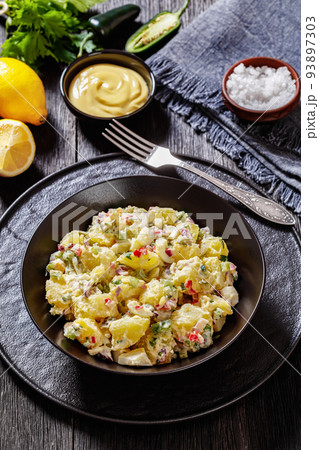 shout hallelujah potato salad in black bowl 93897303