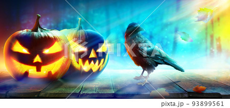 Horror background with scary crow in the darkness 93899561