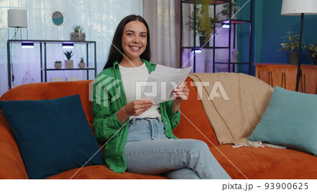 Girl open envelope letter reads it feel happy, career growth advance promotion, bank loan approve Girl open envelope letter reads it feel happy, career growth advance promotion, bank loan approve 93900625