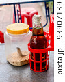 Fish sauce in plastic cap, ingredients of thai street food 93907139