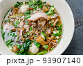 Noodles with pork and pork balls with soup Thai style. 93907140