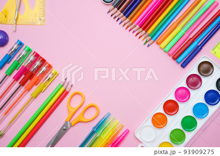 School supplies, colored pencils and watercolor paint pens, sticky notes 93909275
