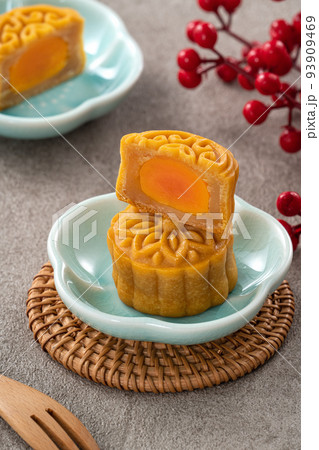 Delicious Cantonese moon cake for Mid-Autumn Festival food mooncake on gray table background. 93909469