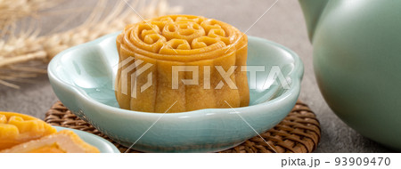 Delicious Cantonese moon cake for Mid-Autumn Festival food mooncake on gray table background. 93909470