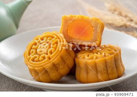 Delicious Cantonese moon cake for Mid-Autumn Festival food mooncake on gray table background. 93909471